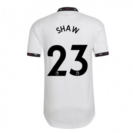 Kandiny Muži Luke Shaw #23 Biely Dresy Idegenbeli Csapatmez 2022/23 Triĭká